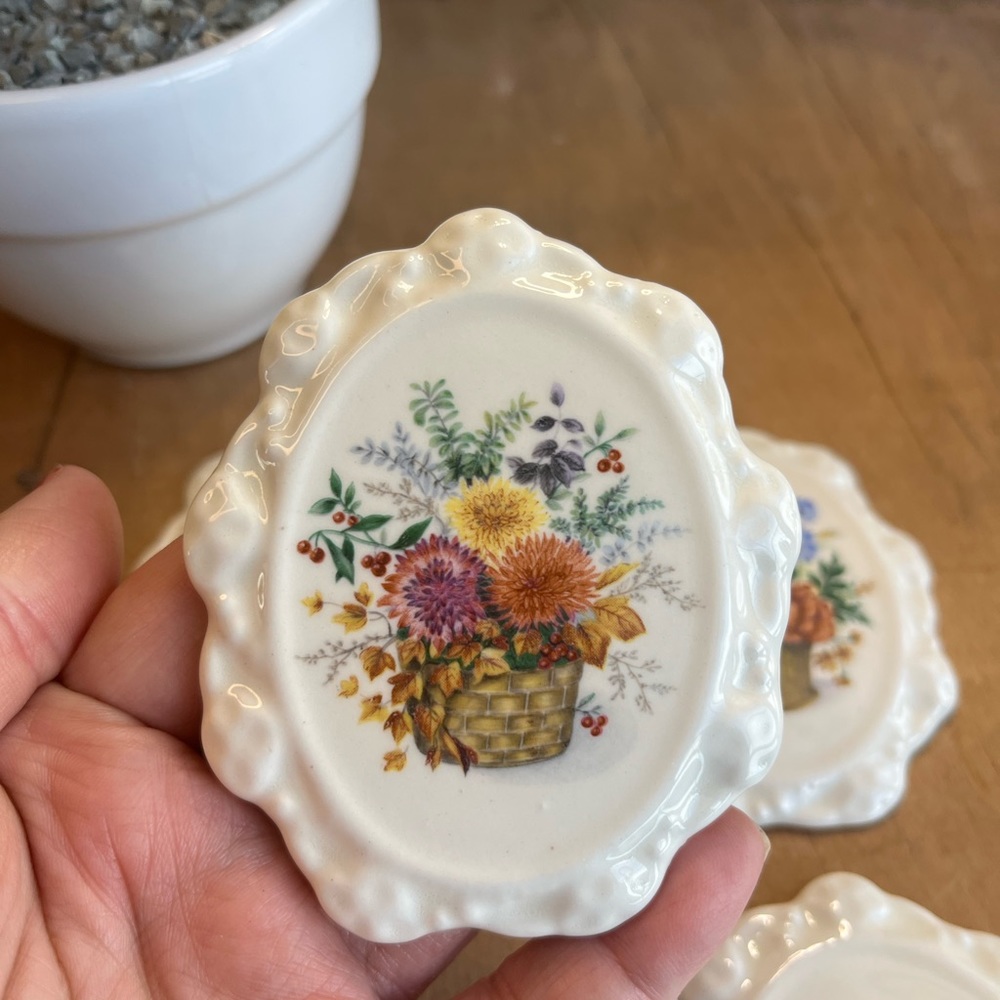 Set of 4 Ceramic Floral Oval Tiles, Each Tile Features a Different floral Design